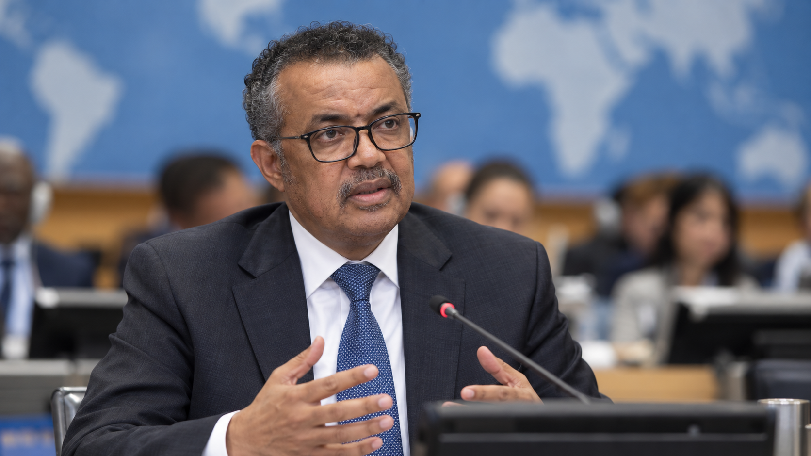 AI-created realistic portrait of Tedros Adhanom Ghebreyesus in a global health briefing room.