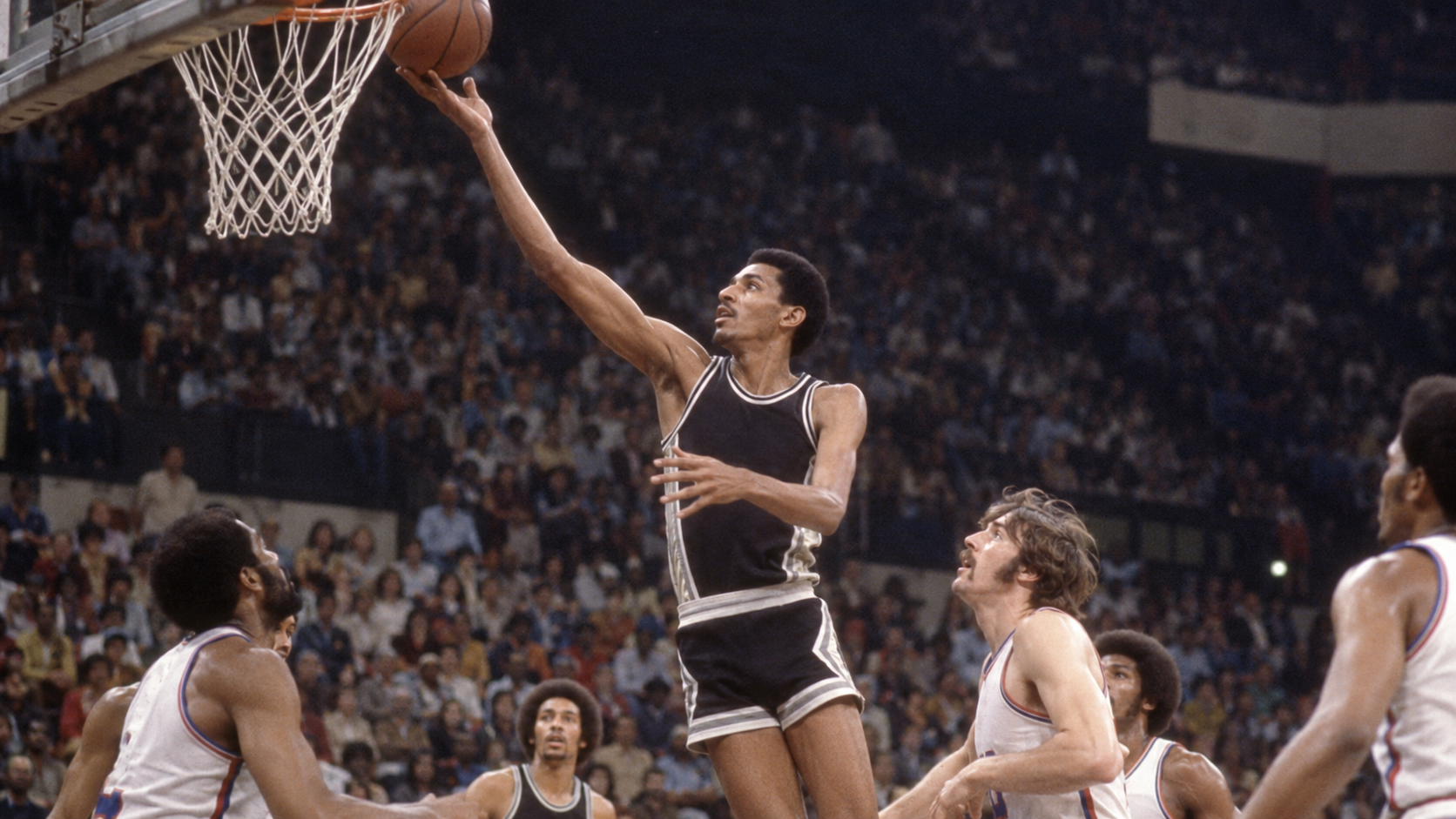 Photorealistic historical reconstruction of George Gervin scoring during his 63-point game in 1978.