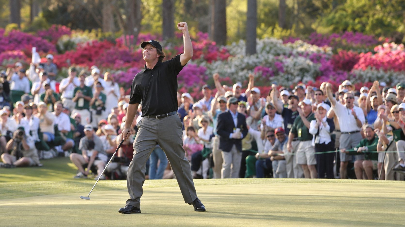 Photorealistic historical reconstruction of Phil Mickelson celebrating his winning putt at the 2004 Masters.