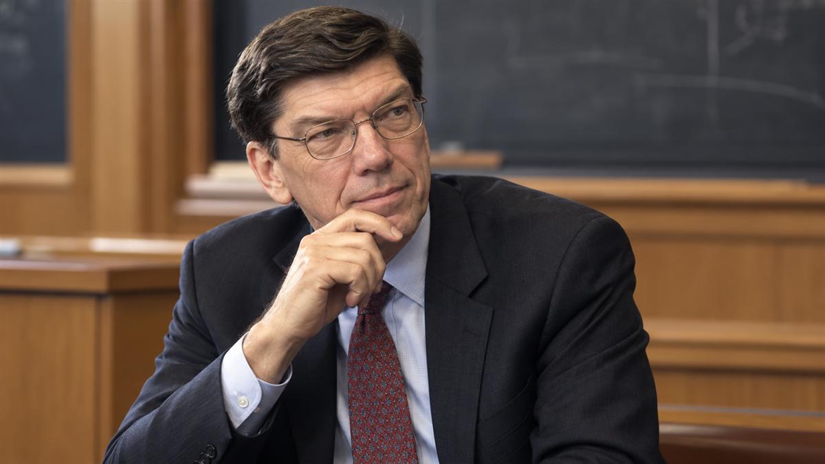 AI-generated editorial portrait of Clayton M. Christensen in a reflective Harvard lecture setting