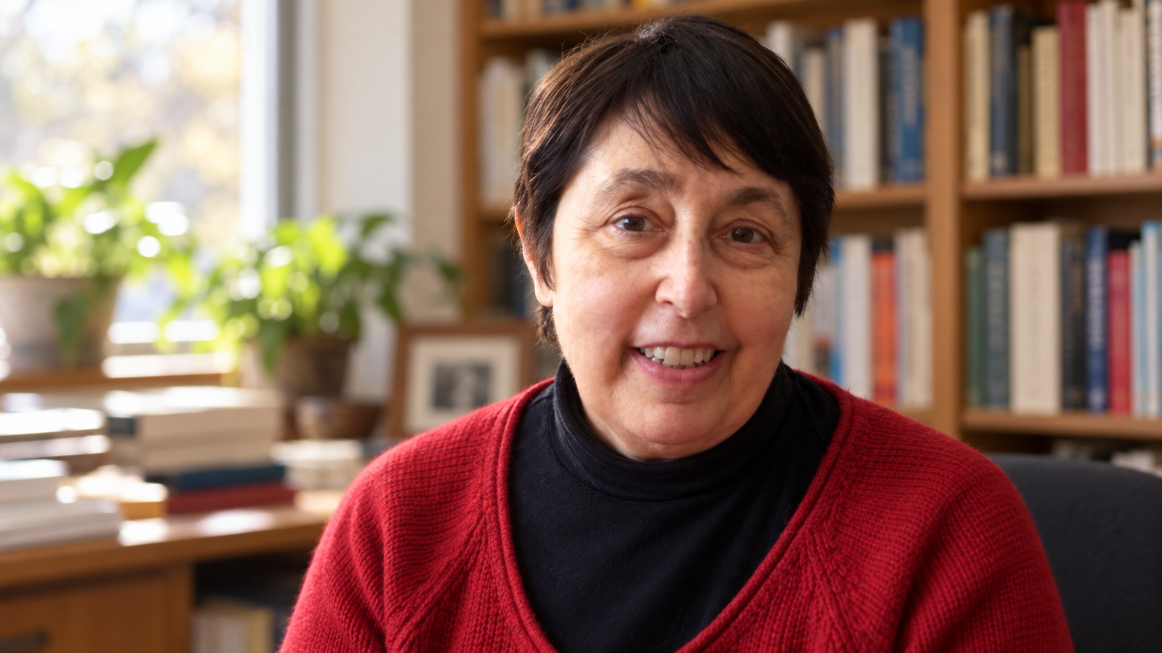 AI-generated realistic portrait of Judith Herman in an academic psychiatry office.