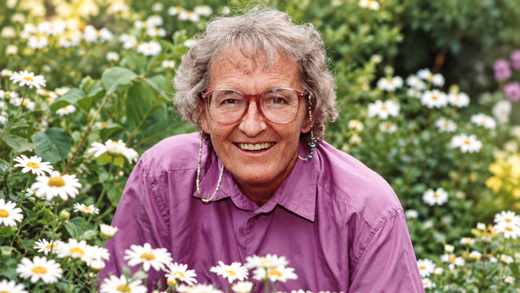 AI-generated realistic portrait of Elisabeth Kübler-Ross in a peaceful garden.