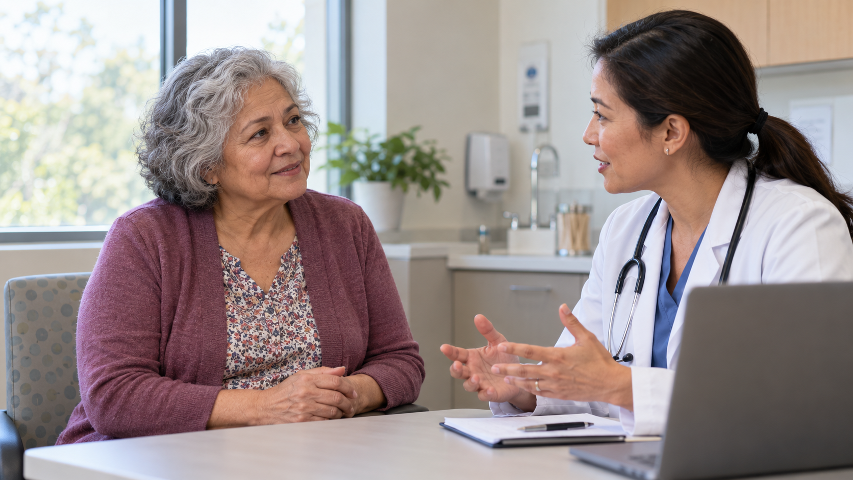 An older woman discussing digestive health with a clinician