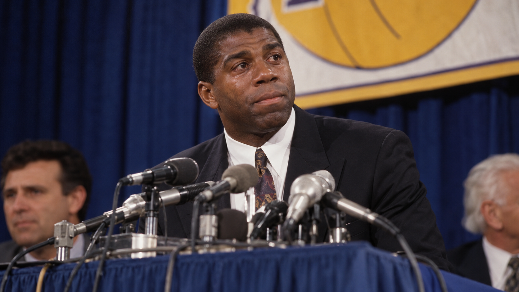 Photorealistic historical reconstruction of Magic Johnson announcing his retirement in 1991.