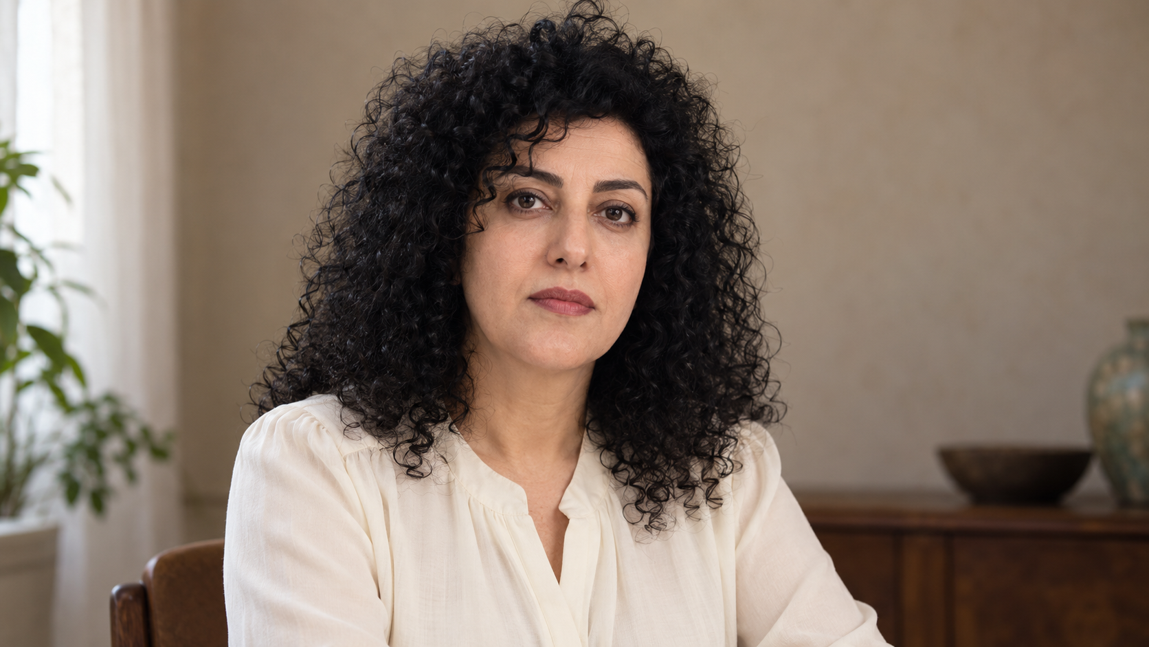 Realistic editorial recreation of Narges Mohammadi for a historical quote post.