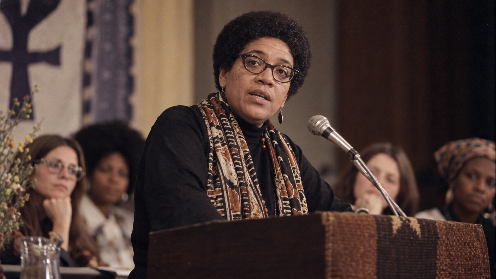 AI-generated editorial recreation of Audre Lorde in the setting connected to the 1977 quotation.