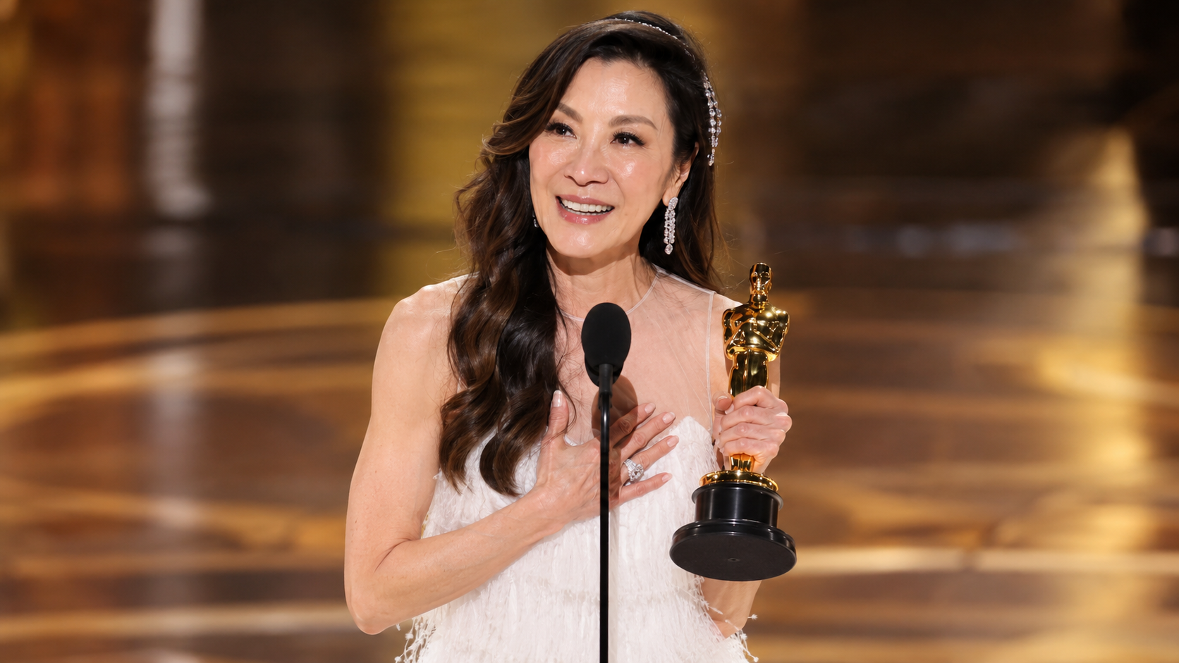 AI-generated editorial portrait of Michelle Yeoh delivering her 2023 Academy Awards speech.