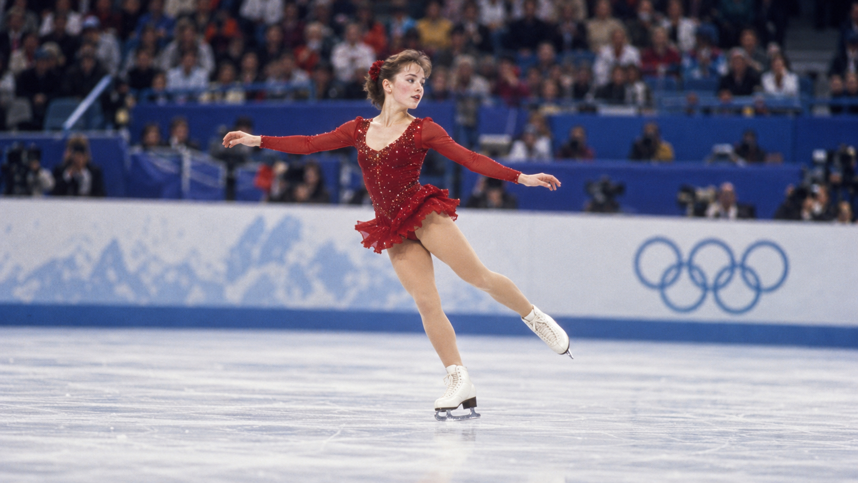 Photorealistic editorial reconstruction of a young figure skater winning Olympic gold