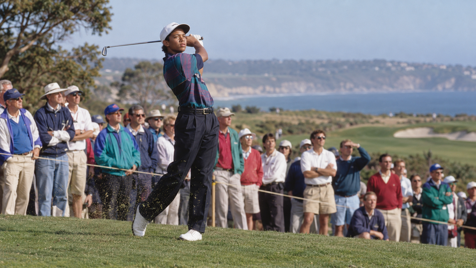 Photorealistic editorial reconstruction of a teenage golfer making his professional tour debut