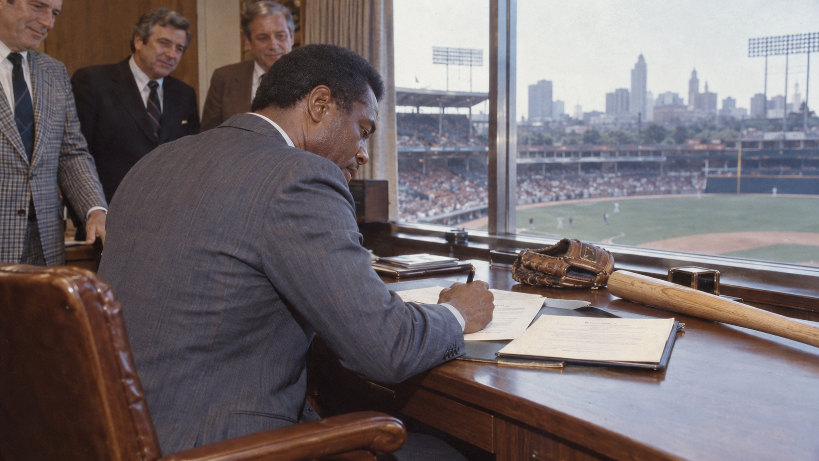 Photorealistic editorial reconstruction of a veteran baseball slugger signing a landmark contract