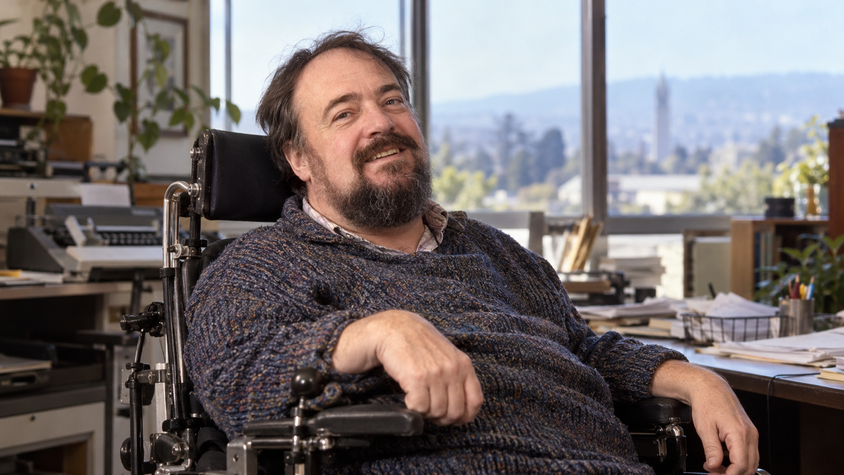 Ed Roberts in a 1980s independent-living center office with accessible work surfaces
