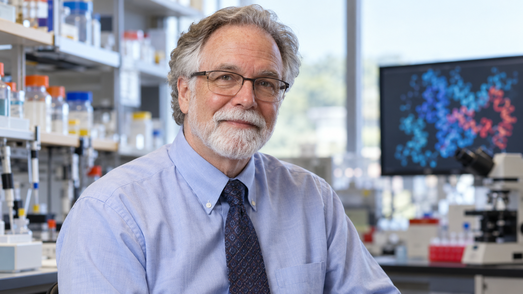 Gregg L. Semenza in a molecular-medicine laboratory with a subtle oxygen-response graphic in soft focus